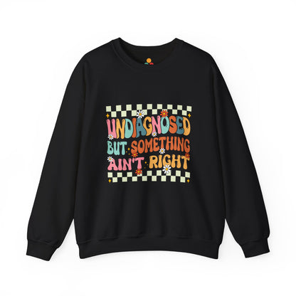 Black sweatshirt with colorful text design on a white background