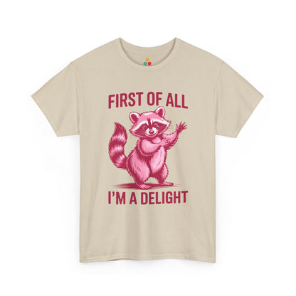 TEEZOCA beige “First Of All I’m A Delight” pink raccoon tee displayed flat.