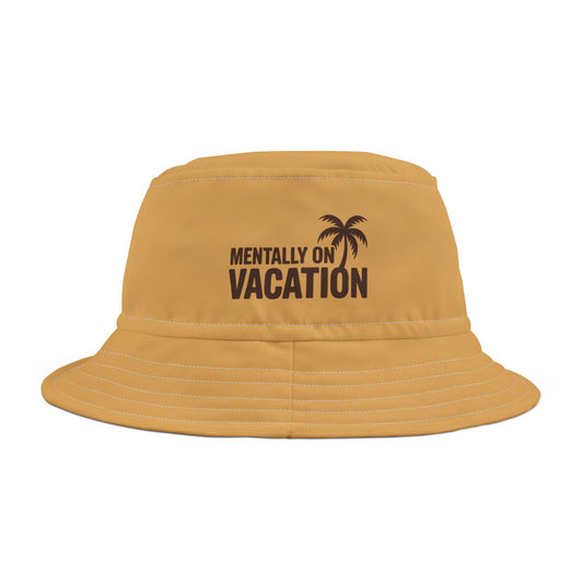 Funny yellow bucket hat with 'Mentally on Vacation' text and palm tree design on a white background. TEEZOCA