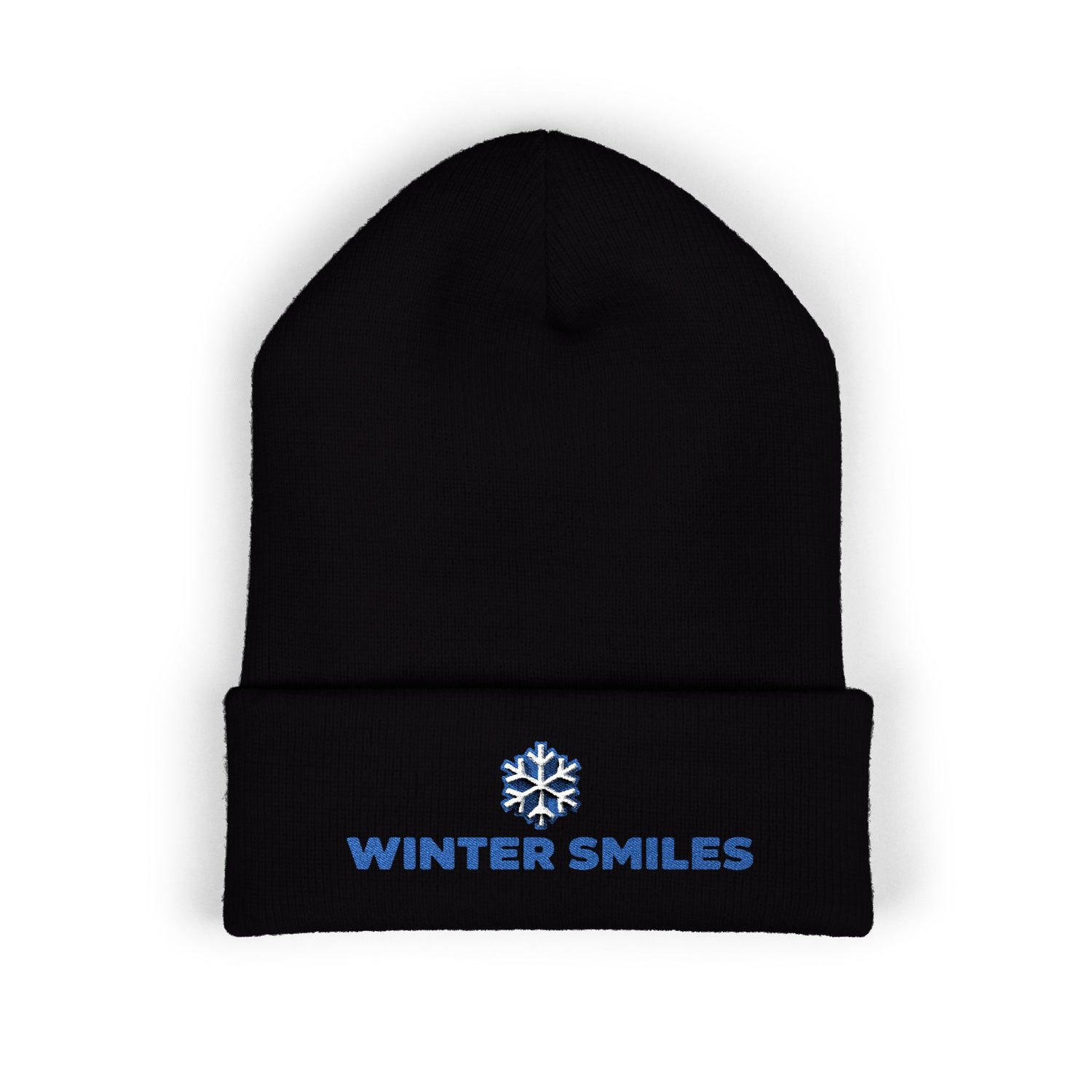 Black beanie with 'Winter Smiles' text and snowflake logo on a white background. Blue embroidered “Winter Smiles” snowflake design on cuffed winter beanie