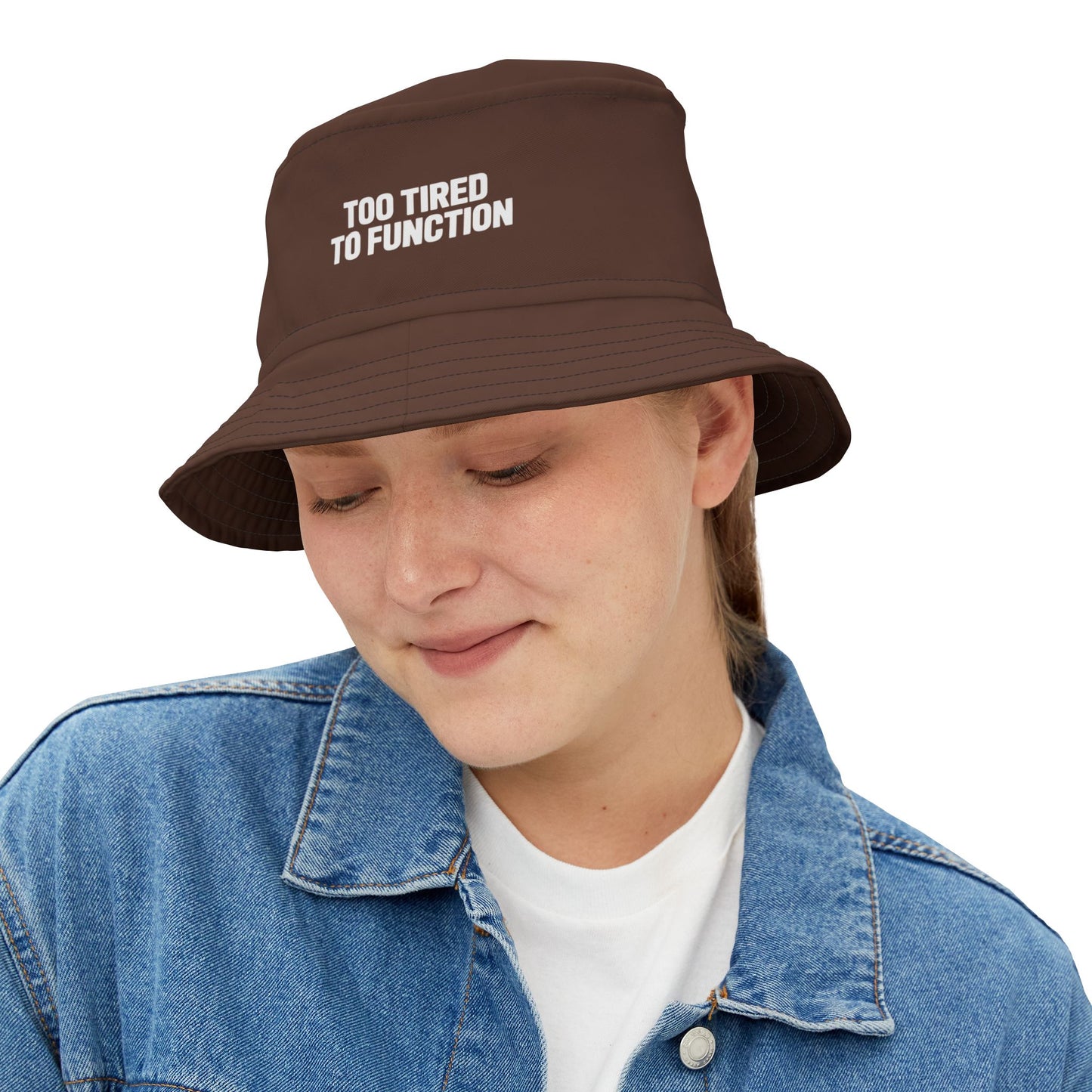 Funny brown bucket hat with 'Too Tired to Function' text on a white background. TEEZOCA