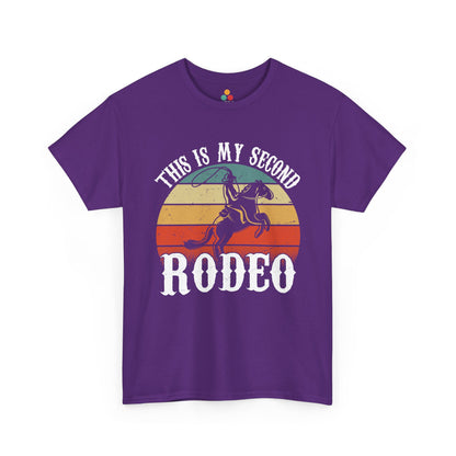 Purple t-shirt with a graphic of a horse and text 'This is my second RODEO' on a white background