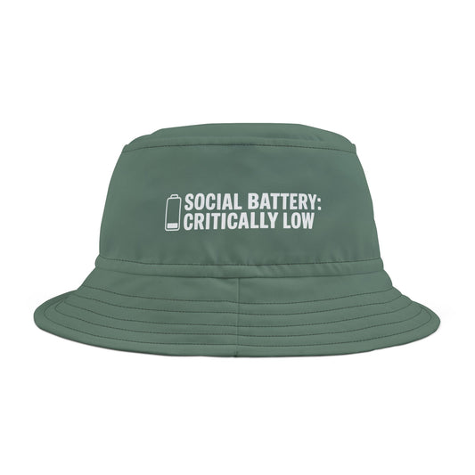 Green bucket hat with funnt text 'Social Battery: Critically Low' on a white background. TEEZOCA
