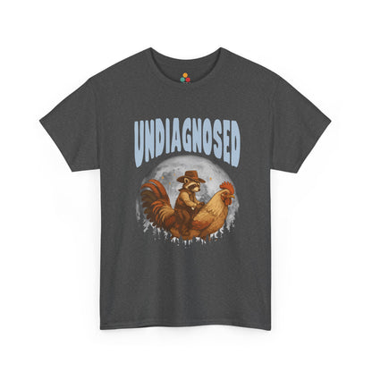 "Dark heather gray t‑shirt with 'Undiagnosed' western design featuring raccoon and cowboy artwork, flat front."

