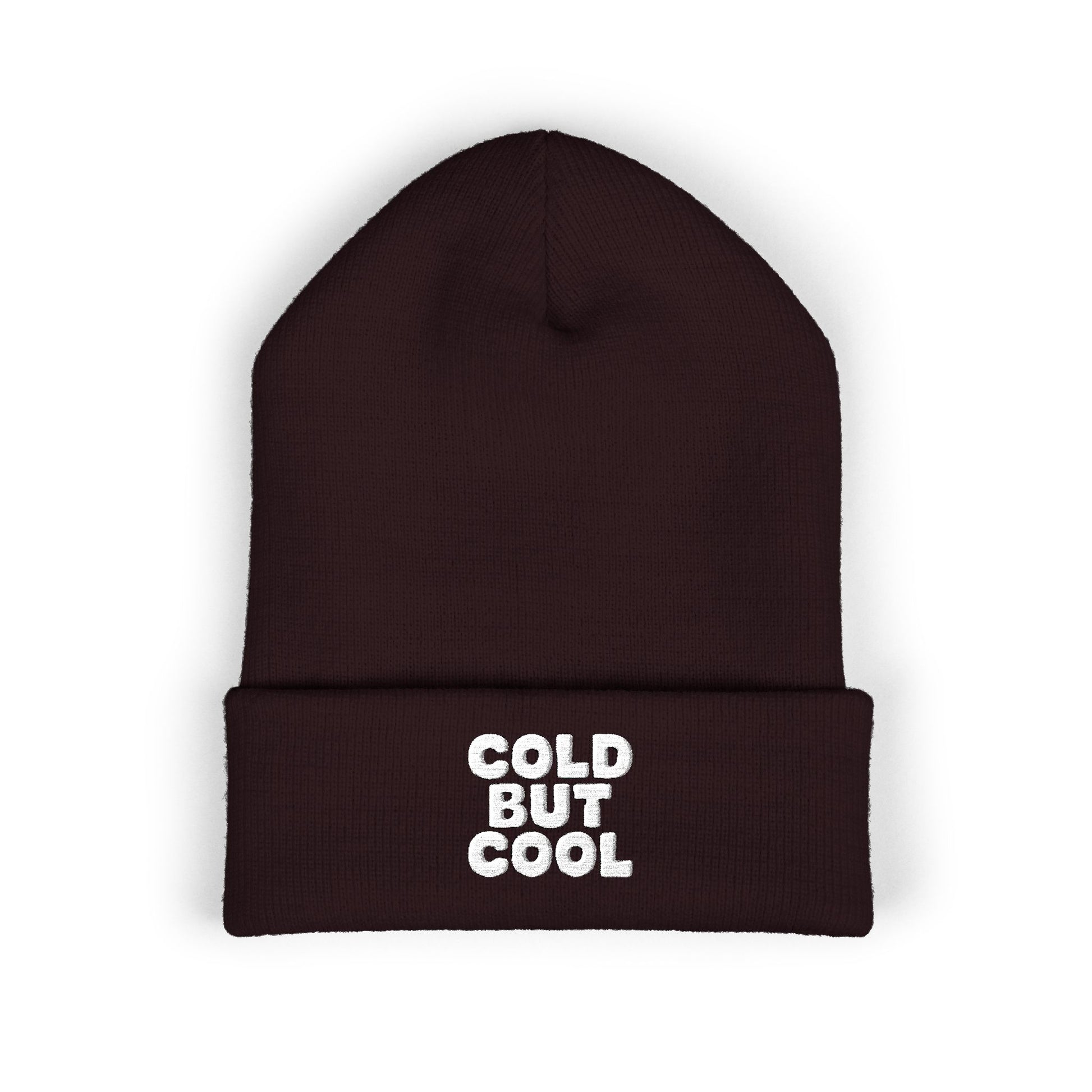 Brown beanie with 'Cold But Cool' text on a white background