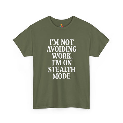 "Olive green t‑shirt with white 'I'm Not Avoiding Work, I'm On Stealth Mode' slogan, flat view."

