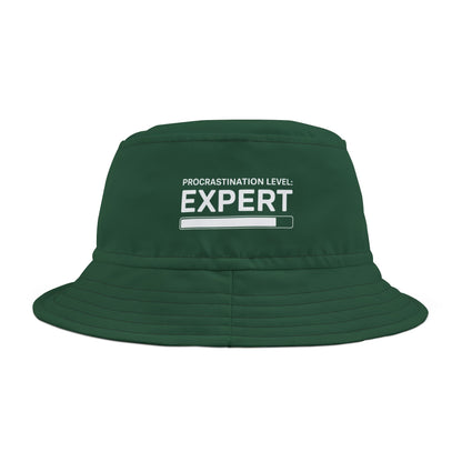 Funny sarcastic green bucket hat with 'Procrastination Level: Expert' text on a white background. TEEZOCA