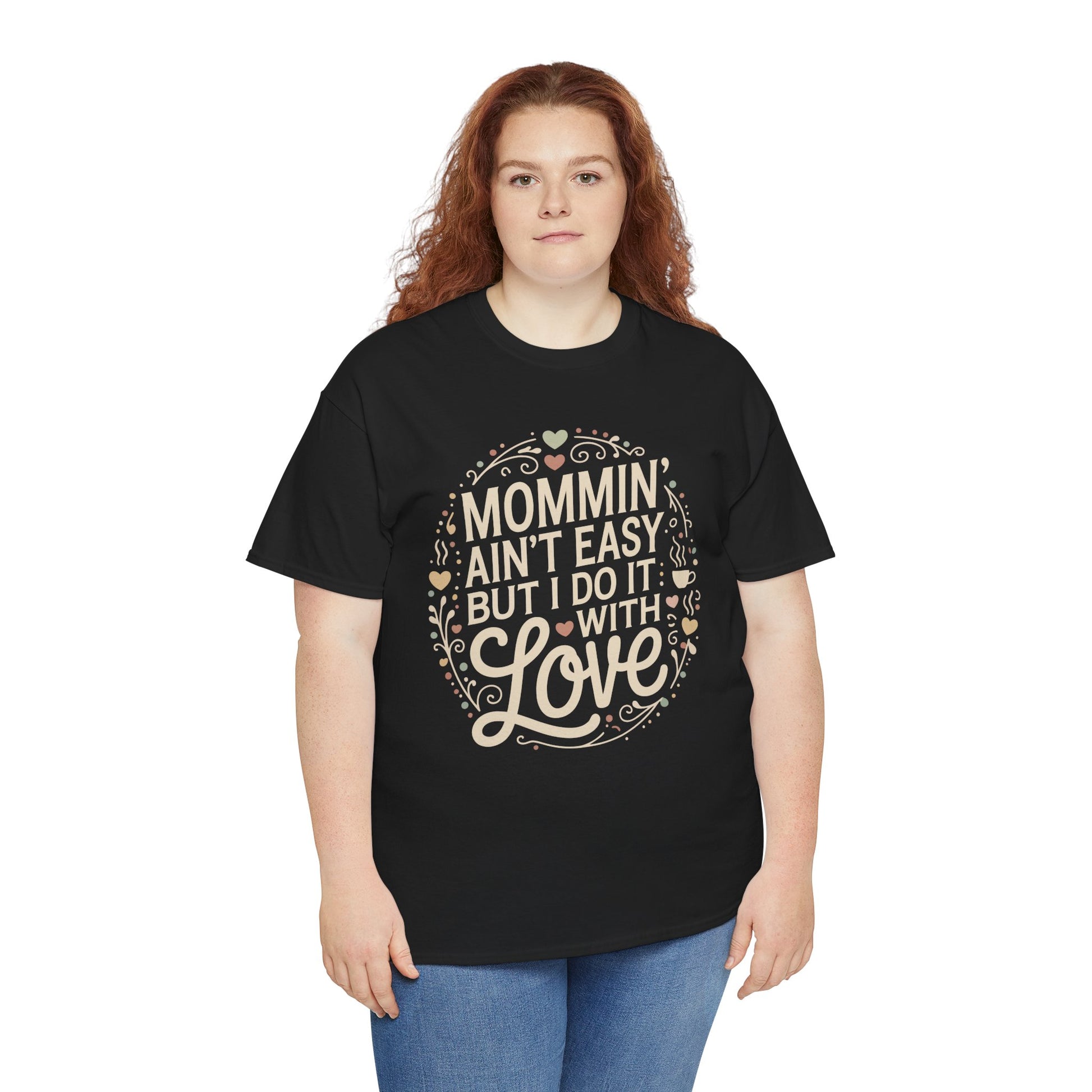 Woman wearing a black TEEZOCA “Mommin’ Ain’t Easy But I Do It With Love” cute mom life t‑shirt.