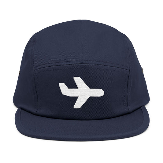 Navy blue cap with a white airplane icon on a white background. Minimal white airplane icon embroidered on black 5-panel cap. TEEZOCA