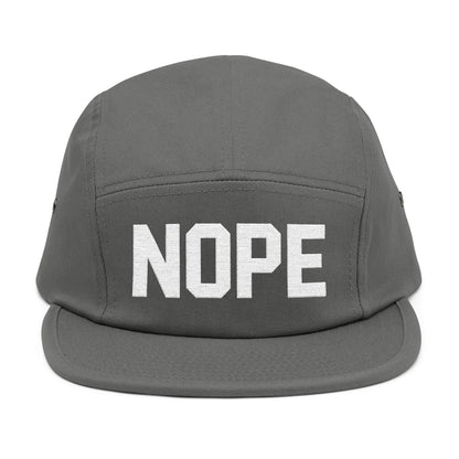 Gray cap with 'NOPE' text on a white background. NOPE bold minimal typography embroidery design on cap. TEEZOCA