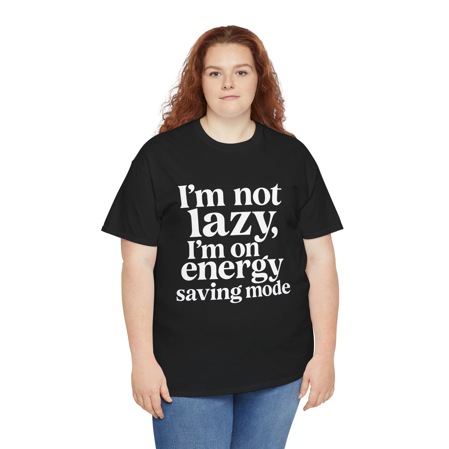 “Female model wearing Teezoca I’m Not Lazy I’m On Energy Saving Mode t-shirt, funny lazy quote design, black unisex tee, front.”
