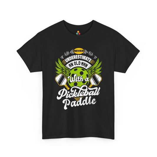 “Teezoca Never Underestimate an Old Man with a Pickleball Paddle shirt, winged green pickleball and crossed paddles graphic, black tee, front view.”

