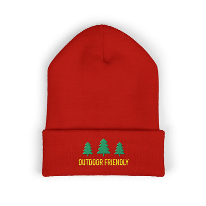 Red beanie with green trees and 'Outdoor Friendly' text on a white background