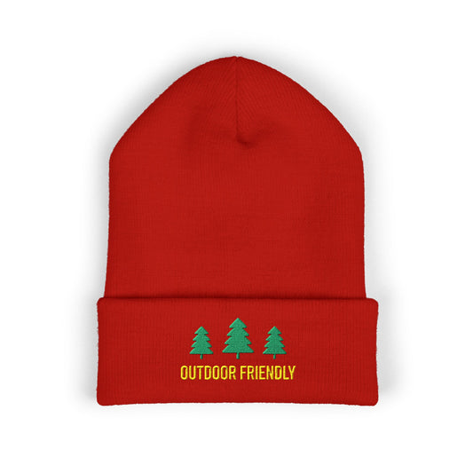 Red beanie with green trees and 'Outdoor Friendly' text on a white background