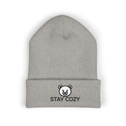 Gray beanie with 'Stay Cozy' logo on a white background