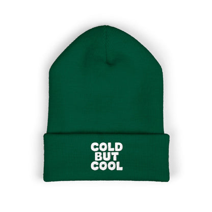 Green beanie with 'Cold But Cool' text on a white background