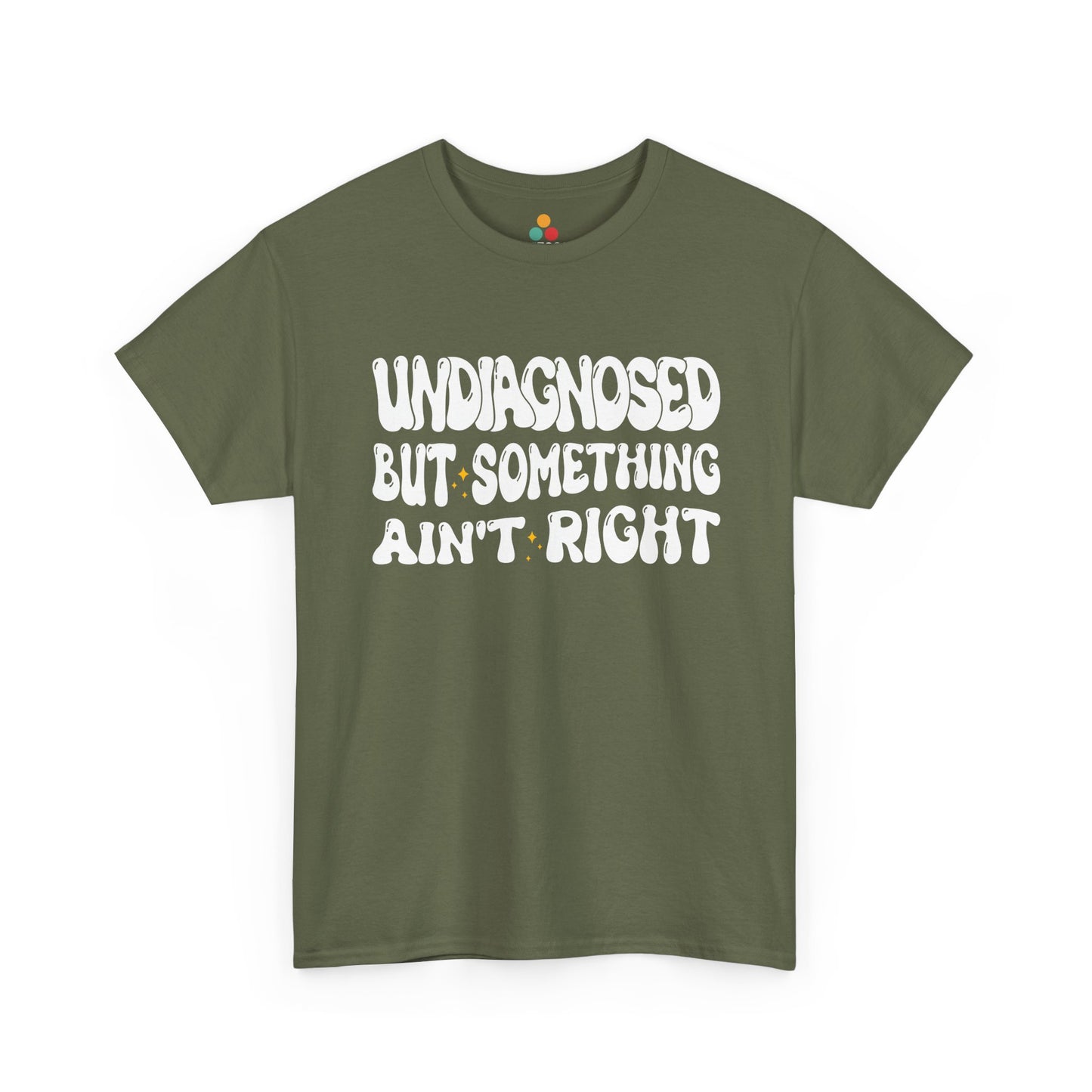 “Teezoca Undiagnosed But Something Ain’t Right shirt, groovy white text design, olive green tee, laid flat.”​


