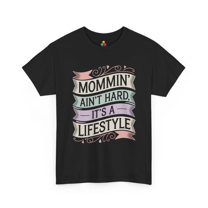 TEEZOCA black “Mommin’ Ain’t Hard, It’s A Lifestyle” pastel banner t‑shirt shown flat.