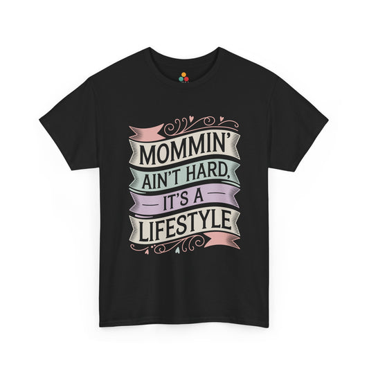 TEEZOCA black “Mommin’ Ain’t Hard, It’s A Lifestyle” pastel banner t‑shirt shown flat.