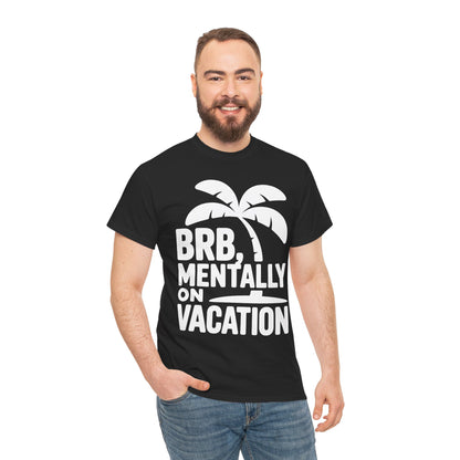 Man wearing a black t-shirt with a palm tree and text design 'BRB, Mentally on Vacation' on a white background | TEEZOCA