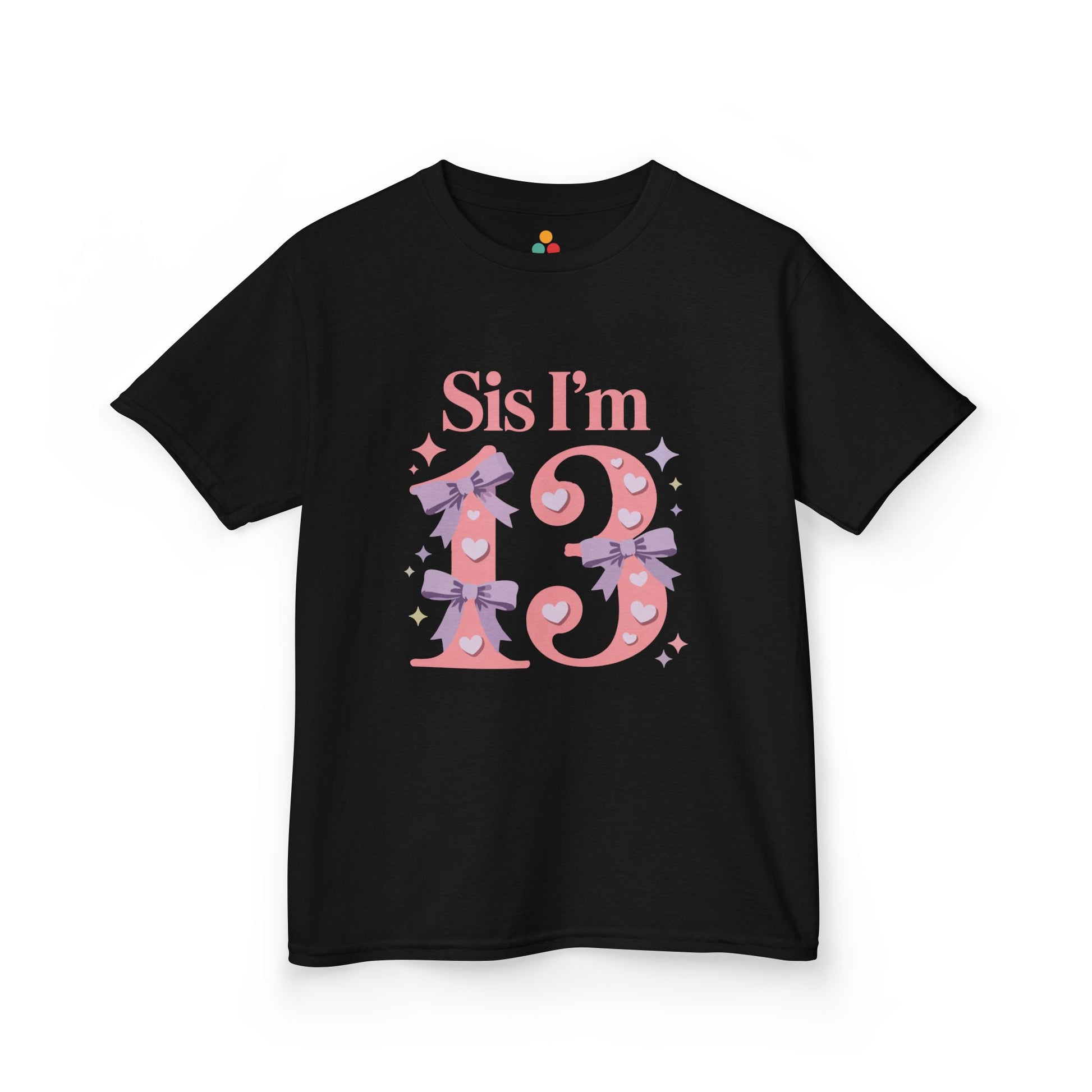Black t‑shirt with pink “Sis I’m 13” design featuring hearts, lilac bows, and sparkles, flat front view.