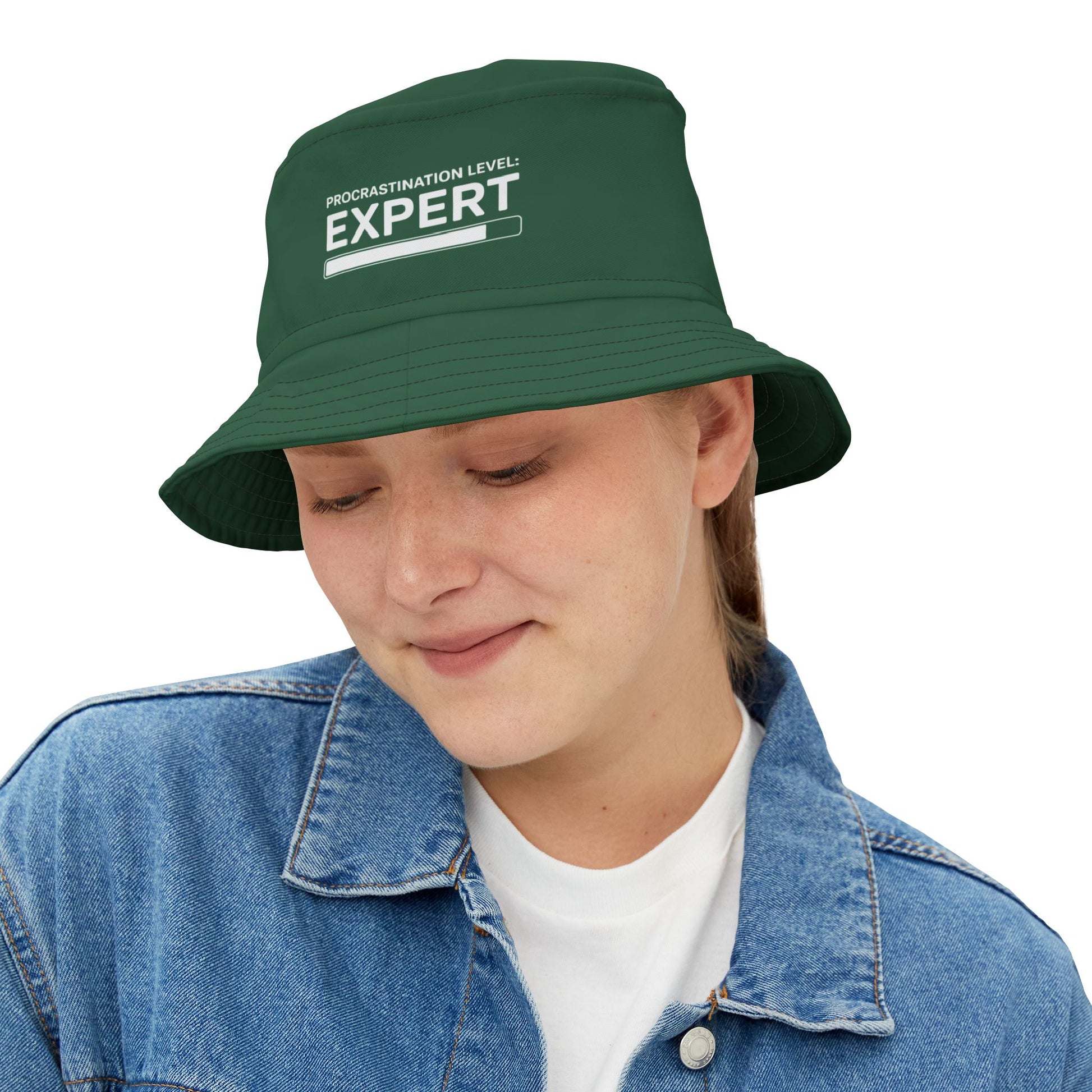 Funny sarcastic green bucket hat with 'Procrastination Level: Expert' text on a white background. TEEZOCA