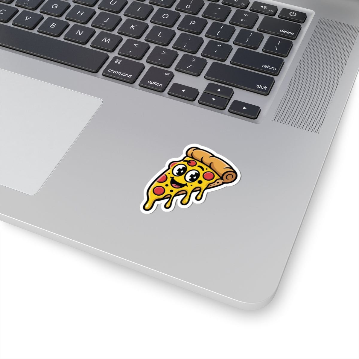 Laptop with a cartoon pizza sticker on the palm rest area. TEEZOCA