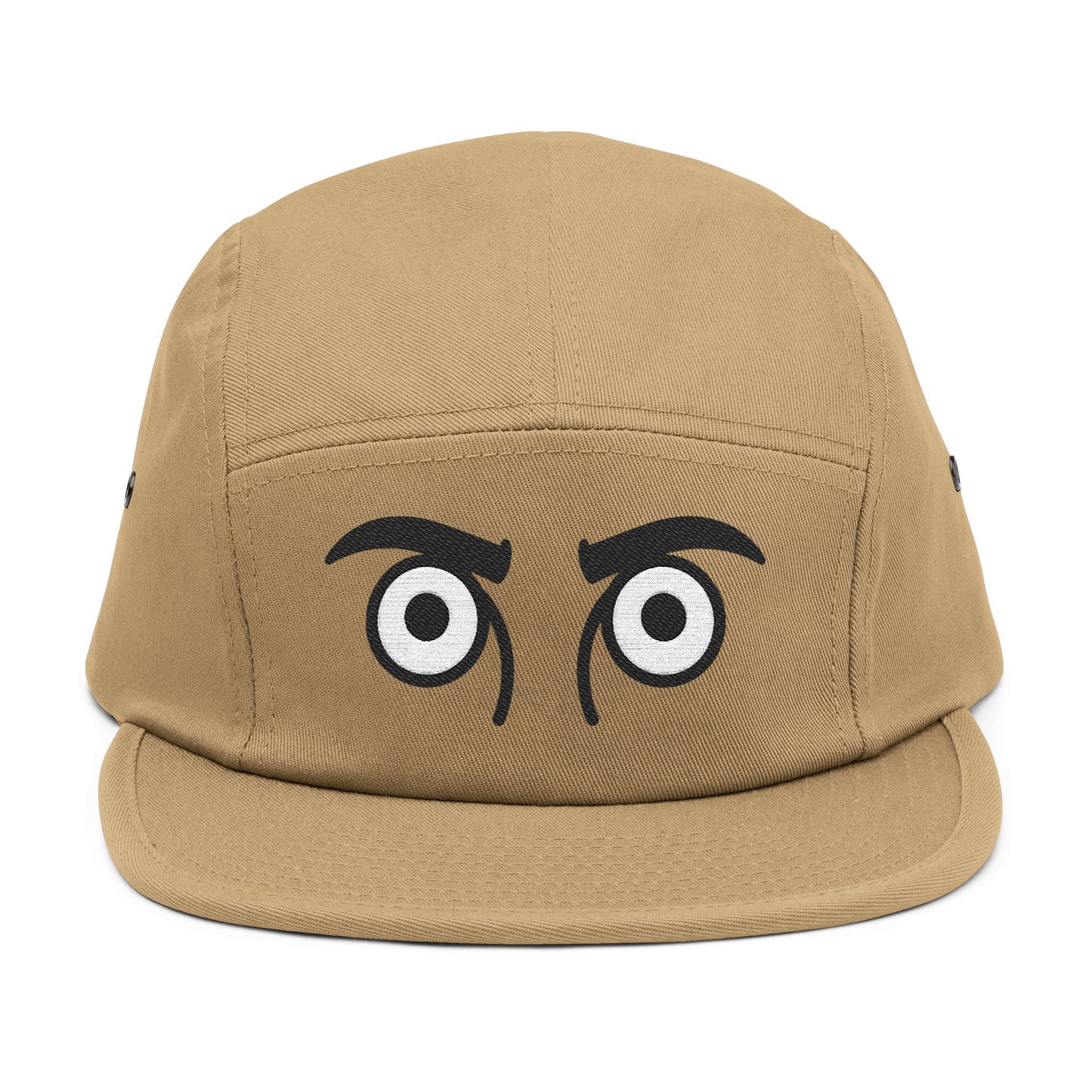 Tan cap with cartoonish eyes on a white background. TEEZOCA