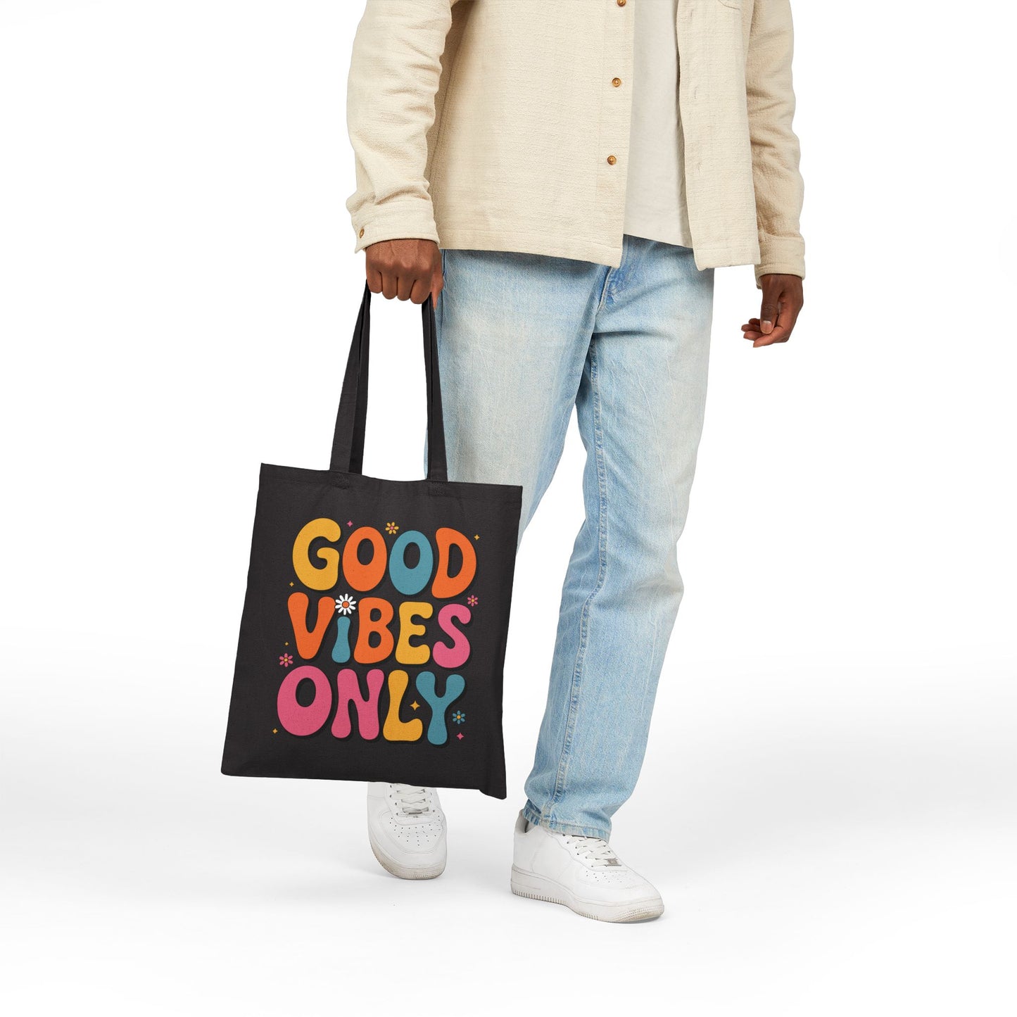 Positive quote Good Vibes Only in colorful text displayed on a TEEZOCA tote bag