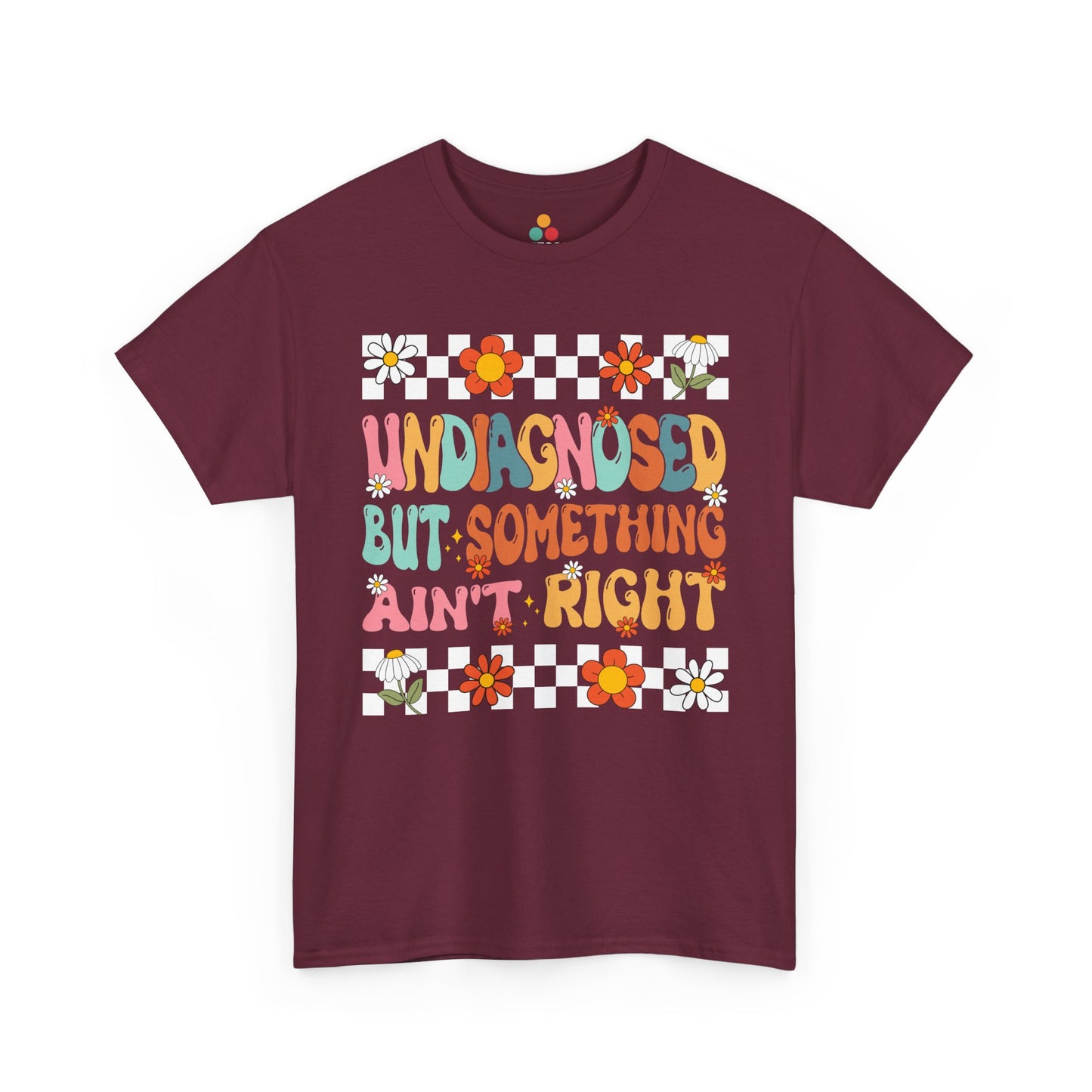 Maroon t-shirt with colorful graphic and text on a white background