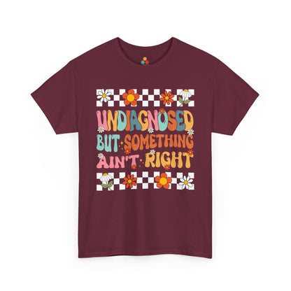 Maroon t-shirt with colorful graphic and text on a white background