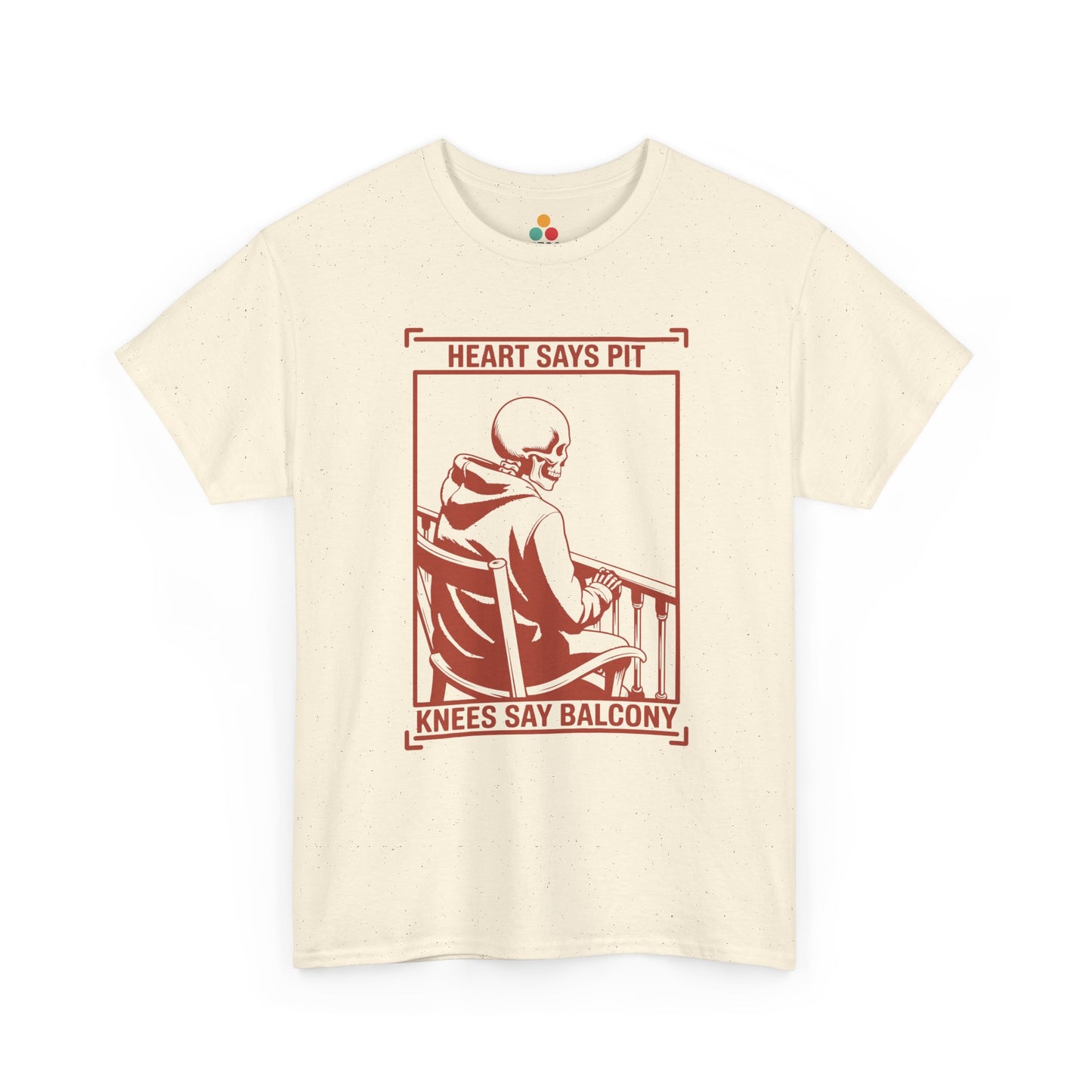 Cream/off-white t-shirt mockup with “Heart Says Pit Knees Say Balcony” skeleton concert quote graphic on front.