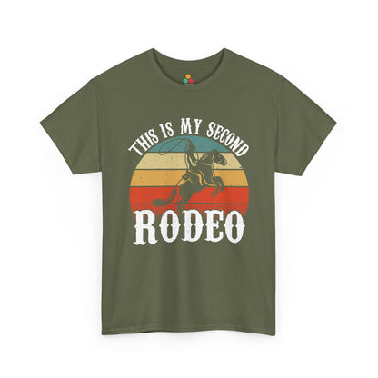Green t-shirt with a graphic design of a cowboy on a horse and text 'This is my second RODEO' on a white background.