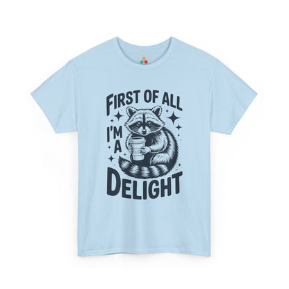 TEEZOCA light blue “First Of All I’m A Delight” novelty raccoon coffee t‑shirt displayed flat.