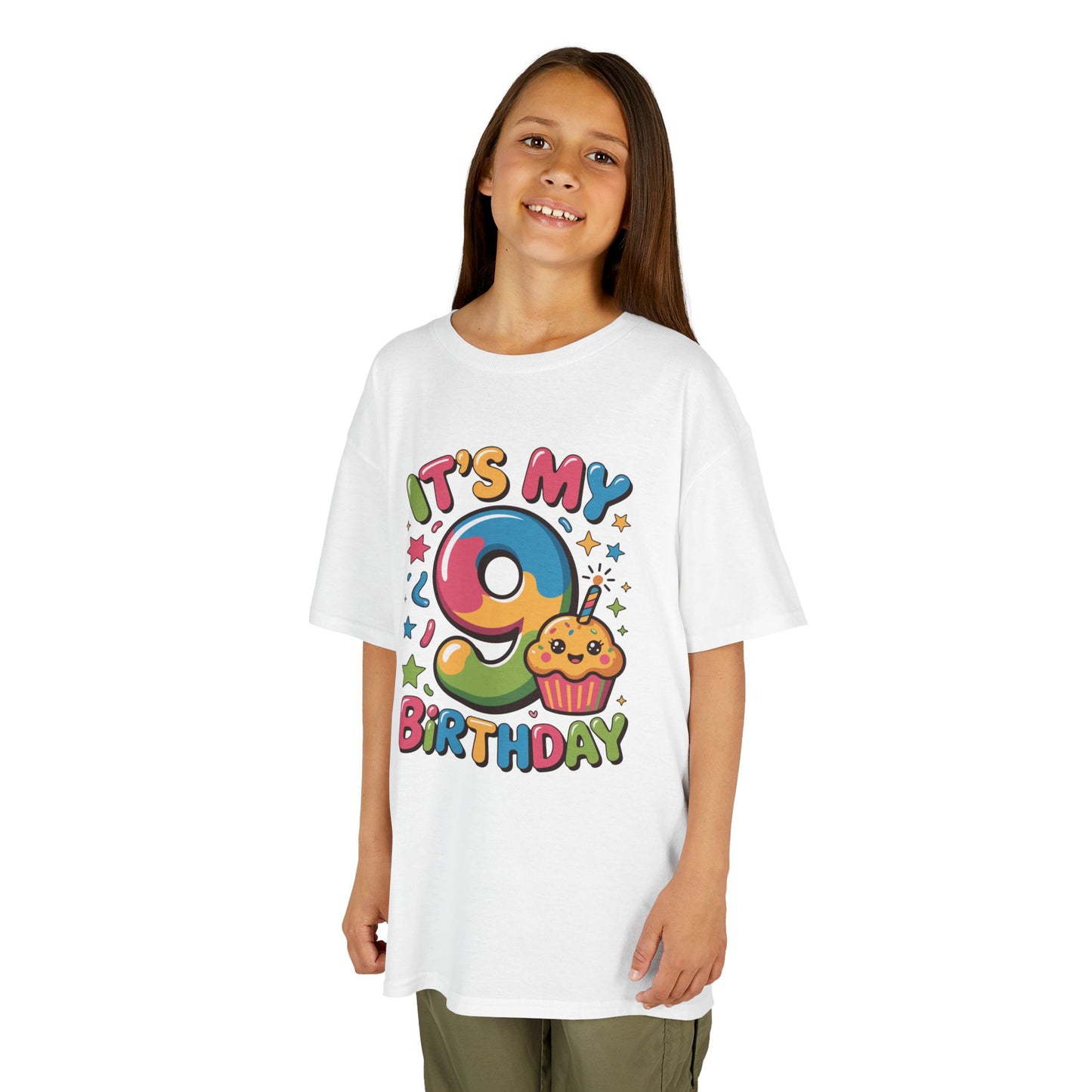 “Girl wearing white ‘It’s My 9th Birthday’ rainbow 9 and cupcake shirt, kawaii birthday graphic, front view.”

