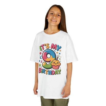 “Girl wearing white ‘It’s My 9th Birthday’ rainbow 9 and cupcake shirt, kawaii birthday graphic, front view.”

