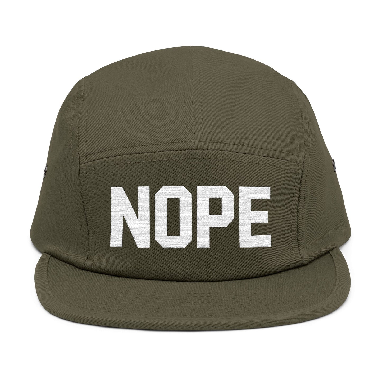 Green cap with 'NOPE' printed on the front panel against a white background. NOPE bold minimal typography embroidery design on cap. TEEZOCA