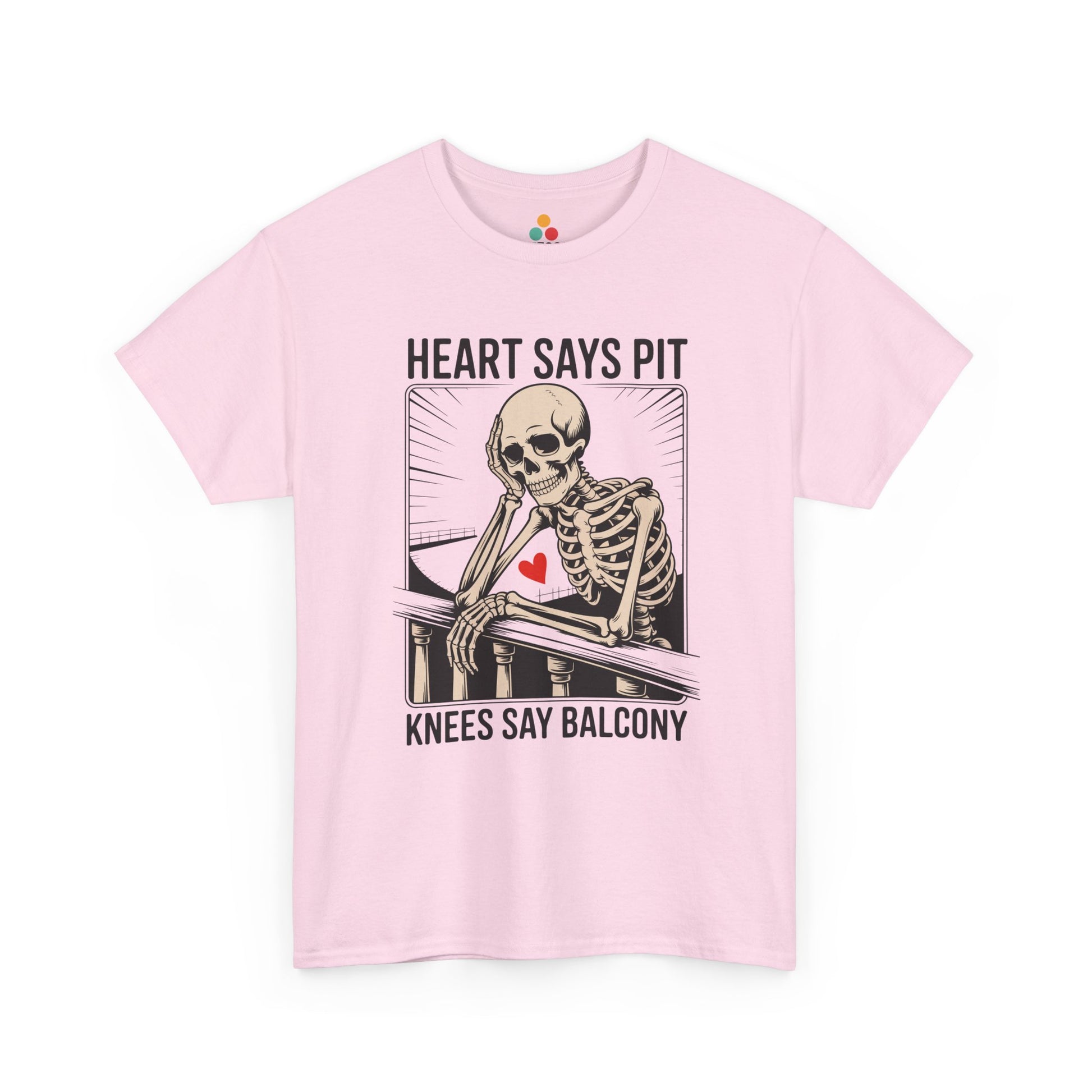 Pink t-shirt mockup with “Heart Says Pit Knees Say Balcony” skeleton balcony quote graphic, front print.​
