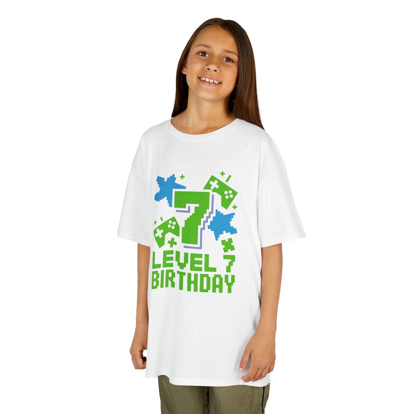 Child wearing a white t-shirt with a 'Level 7 Birthday' design on a white background