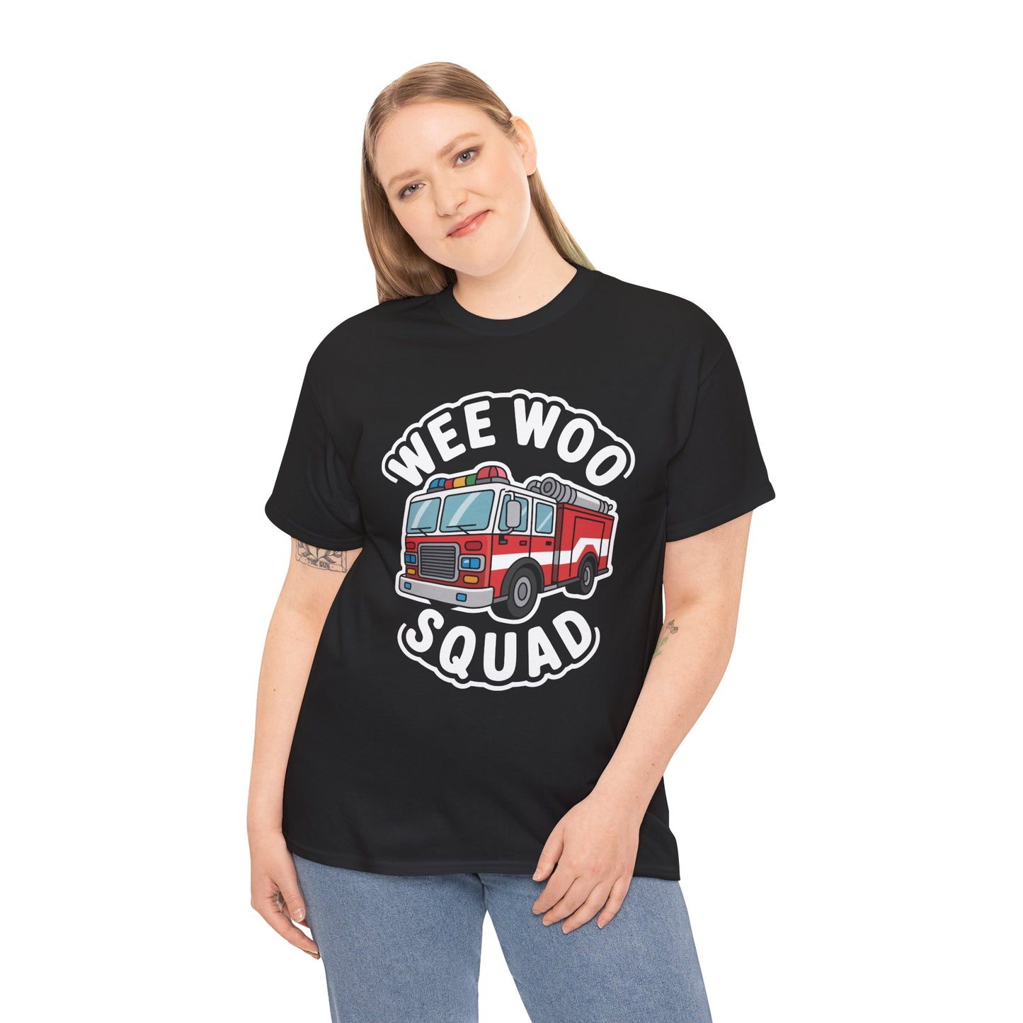 “Female model in Teezoca Wee Woo Squad shirt, funny cartoon fire engine design, black tee, casual pose.”

