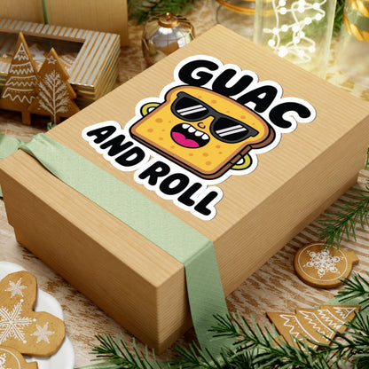 Wooden gift box with a cartoon guacamole face and 'Guac and Roll' text, surrounded by festive decor. TEEZOCA