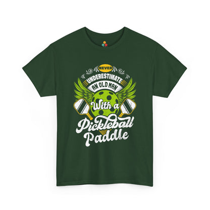 “Teezoca dark green Never Underestimate an Old Man with a Pickleball Paddle shirt, distressed paddles and winged ball, senior league pickleball shirt, front.”


