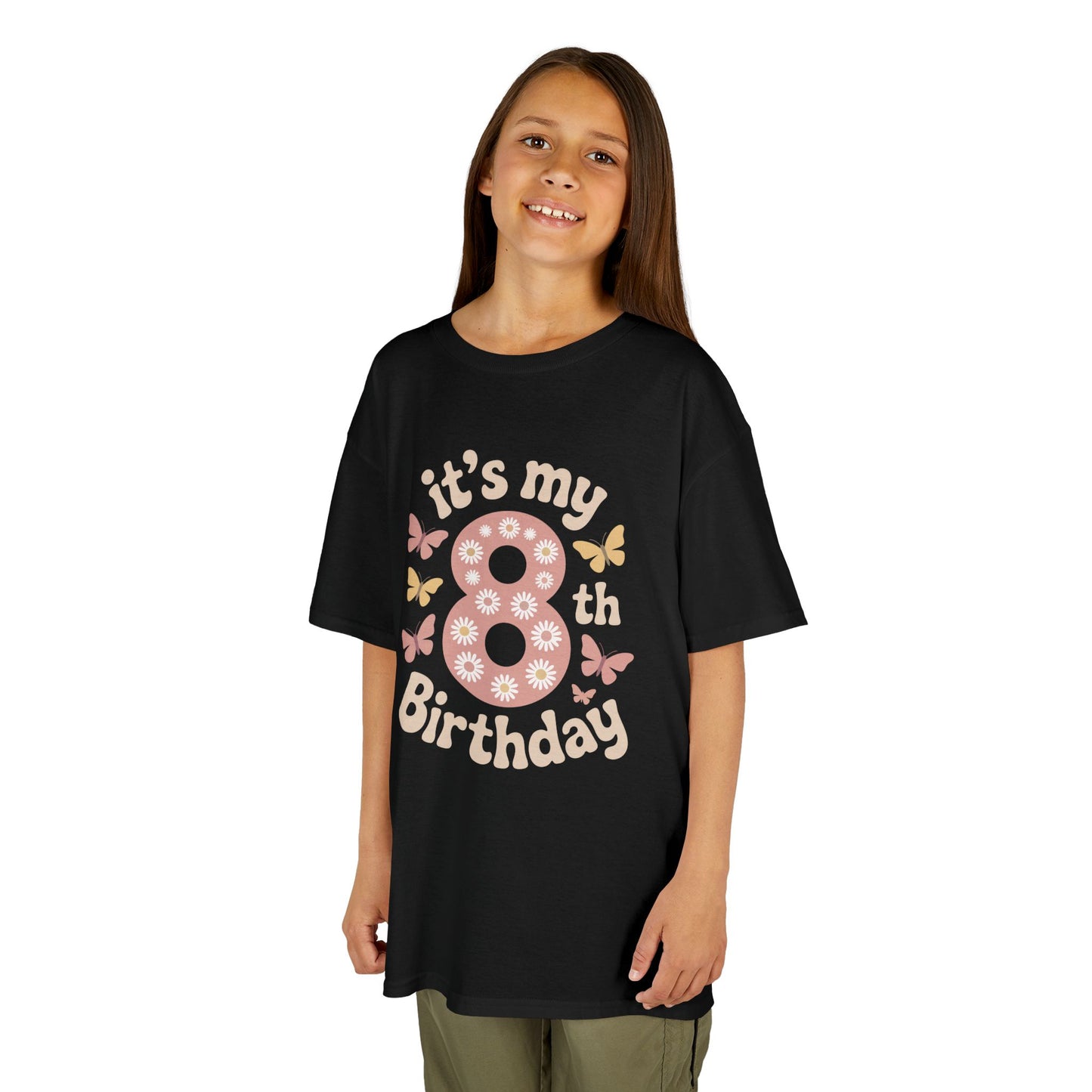 Young girl wearing a black t-shirt with 'it's my 8th Birthday' text on a white background
