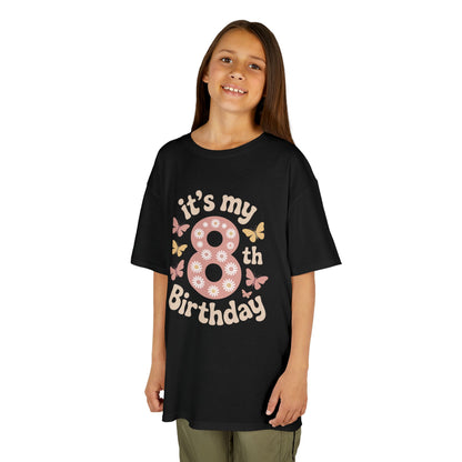 Young girl wearing a black t-shirt with 'it's my 8th Birthday' text on a white background