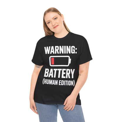 Person wearing a black t-shirt with humorous text 'WARNING: BATTERY (HUMAN EDITION)' design on a white background | TEEZOCA