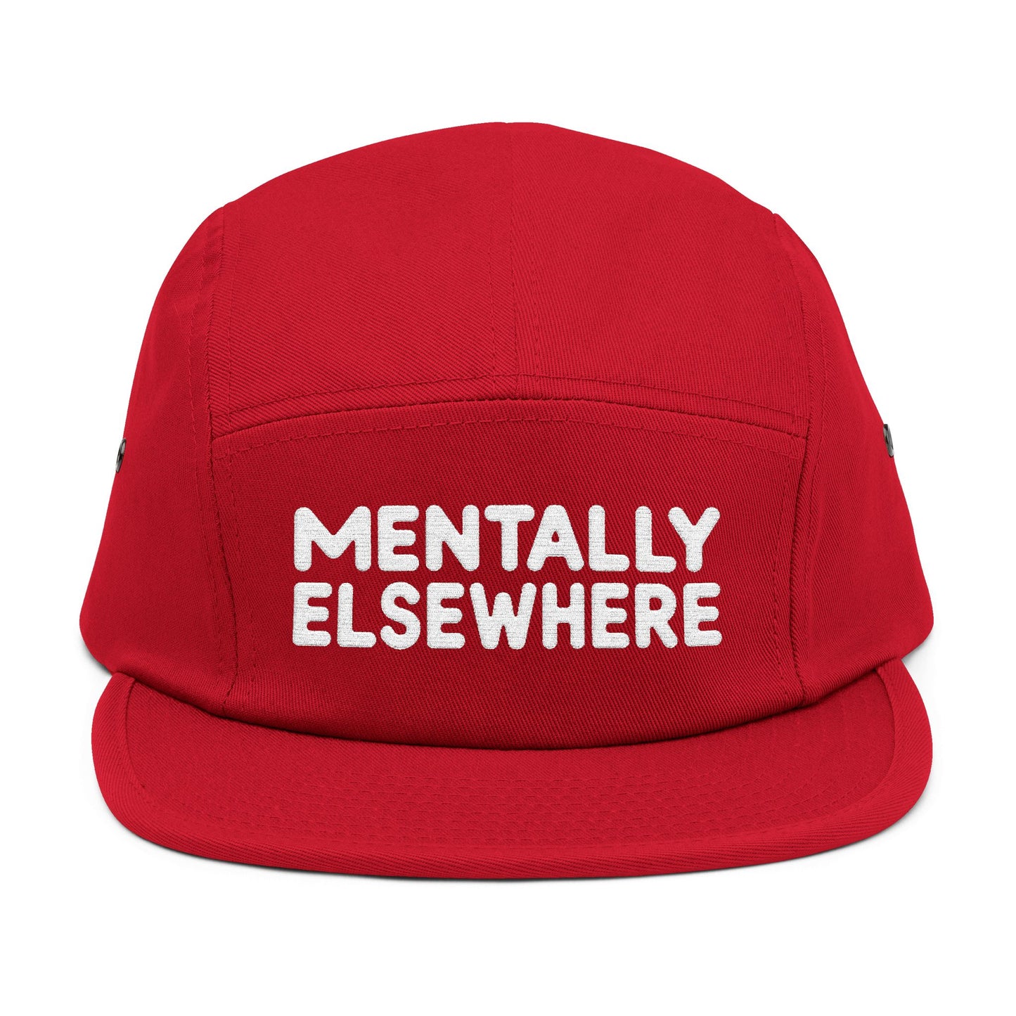 Red cap with 'MENTALLY ELSEWHERE' text on a white background. Mentally Elsewhere embroidered text design on five-panel cap. TEEZOCA