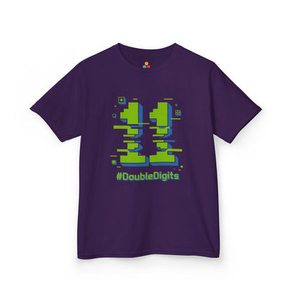 Purple kids’ t‑shirt with neon green and blue pixel number 11 and “#DoubleDigits” gamer text, flat front view.