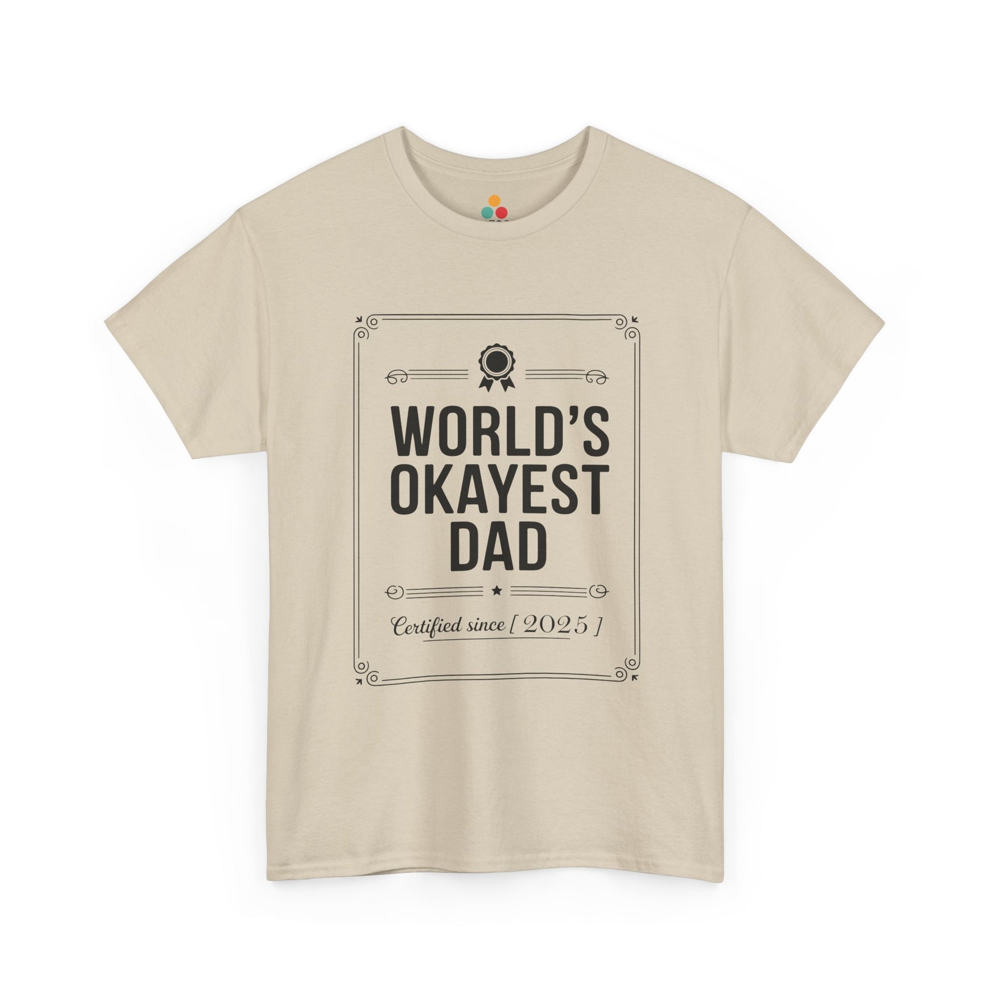 TEEZOCA beige “World’s Okayest Dad Certified Since 2025” novelty dad t-shirt laid flat.