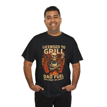 "Man wearing black 'Licensed to Grill – Dad Fuel' skeleton BBQ t‑shirt, front view."

