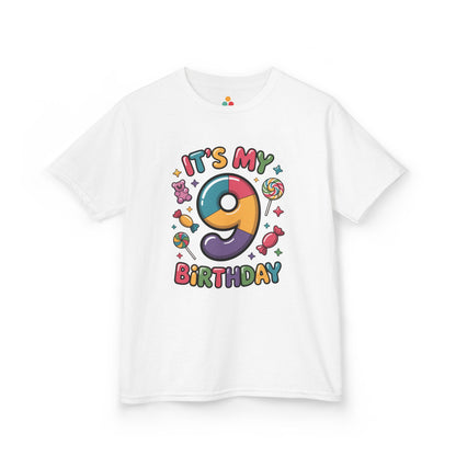 “White ‘It’s My 9th Birthday’ t-shirt with rainbow number 9 surrounded by candy, lollipops, gummy bear and stars, kids birthday design, flat front view.”

